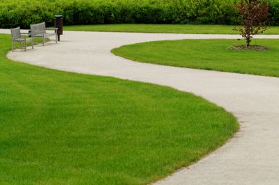 Concrete Walkways Vs. Pavers: Which Option Fits Your Property Best